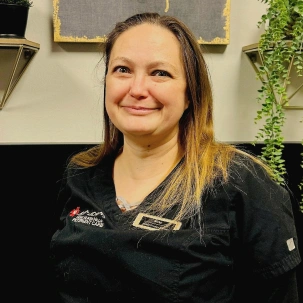 Becky, LVT, helping provide quality veterinary care.