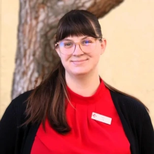 Emily providing compassionate veterinary care and support for pets.