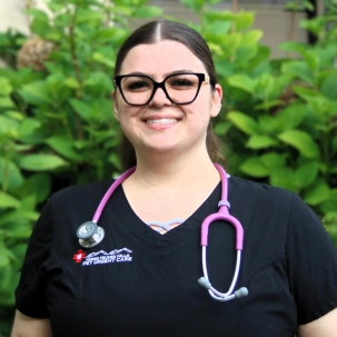 Jayden providing compassionate veterinary care and support for pets.