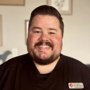 Gavin providing compassionate veterinary care and support for pets.