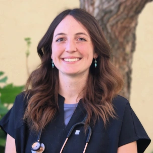 Hannah S. providing compassionate veterinary care for pets.