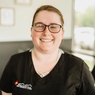 Tamara providing compassionate veterinary care and support for pets.